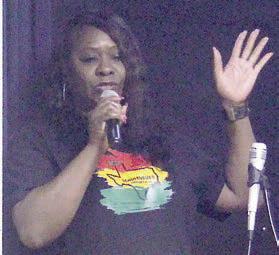 Debra Steward sings “Your Grace and Mercy.” Sticker Photo By Darrell Vyvjala