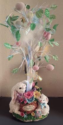 Decorations (two photos above) at the Garden Club meeting on April 1 carried out an Easter theme