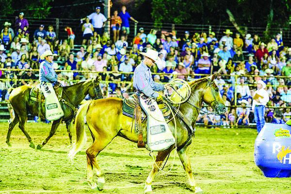 Crowds pack the stands at the Rodeo Arena. Photo By Andy Behlen / Courtesy of Fayette County Record