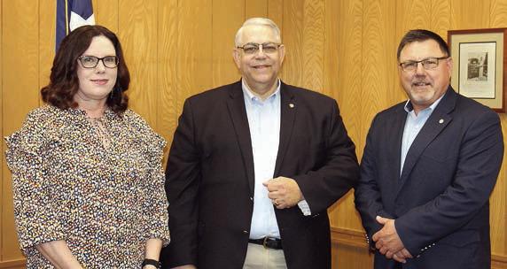 On behalf of th e 5,400 members of Rural Friends/ACRE across Texas, State Rep. Stan Kitzman (center) was thanked for his support for cooperatives. He is shown with Fayette Electric Cooperative marketing and training coordinator Tracy Denton (left) and San Bernard Electric member services manager John Spiess (right). Kitzman represents District 85, which includes Austin, Colorado, Fayette, Fort Bend (part), Waller and Wharton counties.