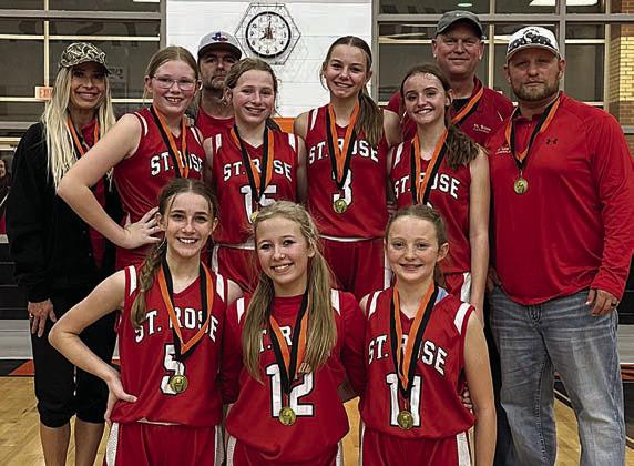 The St. Rose girls’ “A” team defeated La Grange, Bellville, and Shiner St. Ludmila to win the championship of the eight-grade division of Schulenburg ISD’s junior high tournament on Jan. 13. Team members were: (front, from left) Jenna Guentert, Layney Conner, Caroline Bartek; (back, from left) coach Alex Voskamp, Ashtyn Schaefer, coach Matt Bonner, Saybra Pinney, Layne Besetzny, Miranda Bonner, coach Shane Hollas, and coach Ian Voskamp.