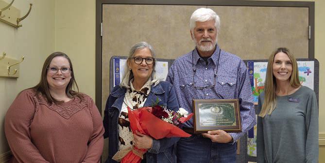 The CONSER VATION RAN CHER award went to Sharon and Anthony Haas (center). Presenters were Amanda Castaneda (left) of Flatonia National Bank and Ashley Firkins (right) of Prosperity Bank.
