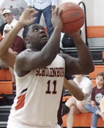 Tavondrick Ellison goes up for a put-back basket