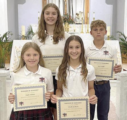 HONOR ROLL 5th grade – (front row, from left) Brylee Stoever, Brielle Goedrich, (back row) Catherine Hooper and Jack Schiffli.