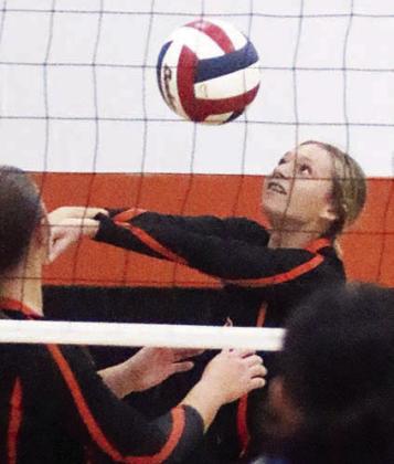 Michaela Kollmann gets to a Louise attack in game one. Sticker Photo By Darrell Vyvjala