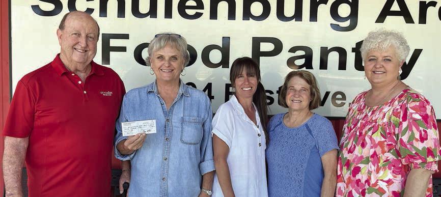 The High Hill-Schulenburg branch of Catholic Life Insurance made a monetary donation to the Schulenburg Area Food Pantry. On hand for the presentation were (from left) Royce Shimek, Catholic Life member; Debra Blansitt and Jamie Zimmermann, representing the Food Pantry; and Jeanette Vaculik and Ann Florus, Catholic Life members.