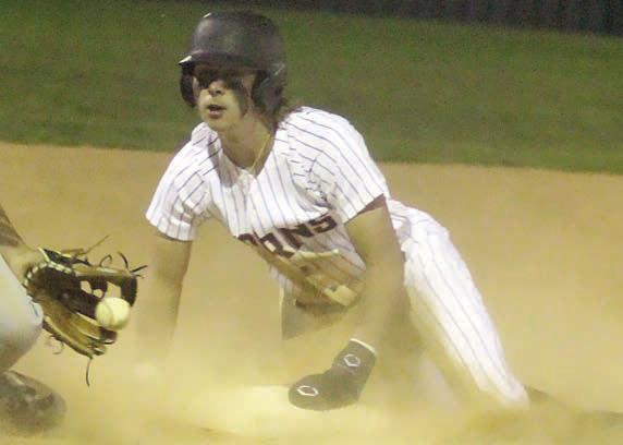 Aaron Janecek takes third on a Weimar wild pitch before scoring in the bottom of the fourth. Sticker Photo By Darrell Vyvjala