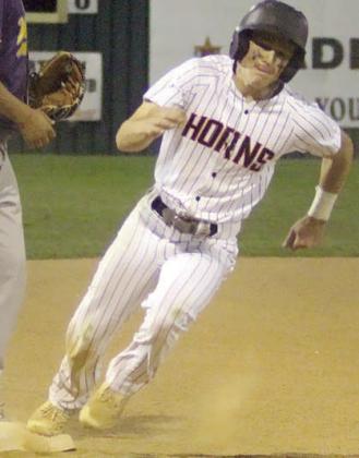 Reid Janda speeds around third base with the tying run in the bottom of the seventh inning last Tuesday. Sticker Photo By Darrell Vyvjala