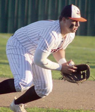 First baseman Tyson Wagner secures a Wildcat grounder for an out. Sticker Photo By Darrell Vyvjala