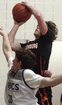 Jayse Janda scores on a drive against Northern Beaches Christian. Sticker Photo By Darrell Vyvjala