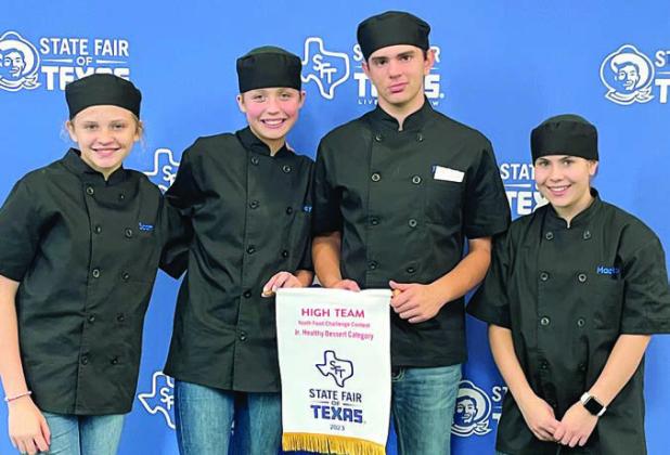 First Place Juni or Team – The team of (from left) Scotti Beseda, Hailey Janish, Kandon Kaspar and Mackayla Griffin came in first in the junior healthy dessert category.