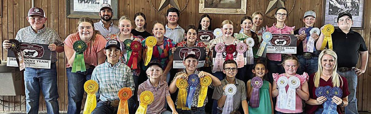 Fayette County 4-H’ers participating in the Guadalupe County Fair Livestock Judging Contest were (front row, from left) Dylan Zweschper, Joe Carrales, Hudson Holub, Tate Fritsch, Emma Zweschper, Abigale McBride, coach Kaci Carrales, (middle row) Abraham McBride, Rheagan Karisch, Julia Melton, Kinsley Kutac, Adalyn Carrales, Kaisley Janecka, Laramie Laake, (back row) coach JoJo Carrales, Addison Berckenhoff, Logan Poncik, Alexis Berckenhoff, Peyton Gilchrest, Tatum Fritsch, Holden Holub and Rilan Karisch.