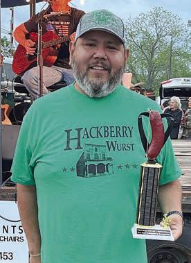 SAUSAGE-BASED CONCOCTIONS - 3RD PLACE: “Hackberry Wurst,” represented by Michael Castillo. Sticker Photo By Darrell Vyvjala