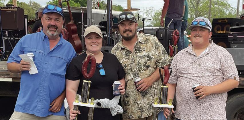 WINE - 2ND PLACE / ‘EVERYTHING BUT THE OINK’ - 1ST &amp;amp; 2ND PLACE: “All About Pevo” – (from left) Jeff Orsak, Morgan and Ben Zahradnik, and Adrian Celedon. Sticker Photo By Darrell Vyvjala