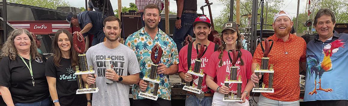 SAUSAGE TOSS ADULT DIVISION: From left: Sausagefest Committee member Debbie Preece, Erin Wotipka of “And Then”; Rylan Sternadel and Ryan Havrda, first place; Jacob and Macy Valenta, second place; Mitchell Bailey and Mike Bullard, third place. Sticker Photo By Darrell Vyvjala