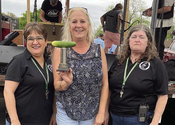 PICKLES - 2ND PLACE: Denise Martin (center). Also shown are Sausagefest Committee members Liz Garcia Vaughan (left) and Debbie Preece. Sticker Photo By Darrell Vyvjala