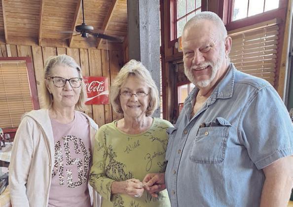 Kathy Loth (center) received her 60-year pin from Mary K. Seifert (left), vice president, and Ed Moeller (right), president.