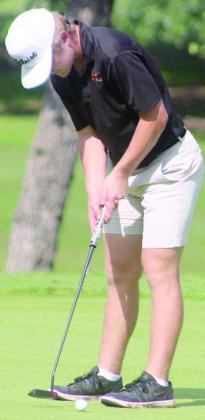 Brycen Schramek rolls in a birdie on the par-4 16th hole during the first round. Sticker Photo By Darrell Vyvjala
