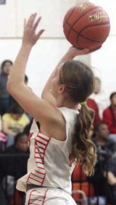 Miranda Bonner finishes a second-quarter drive last Tuesday.