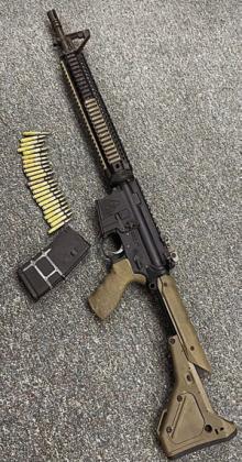 A LOADED AR-15 style rifle was found in the vehicle during the traffic stop.