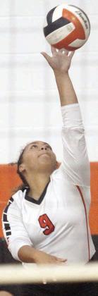 Kieryn Adams serves an ace early in the Lady Horns’ first pool-play match. Sticker Photo By Darrell Vyvjala