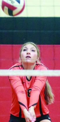 Greenli VanZandt picks up a dig Thursday. Sticker Photo By Darrell Vyvjala