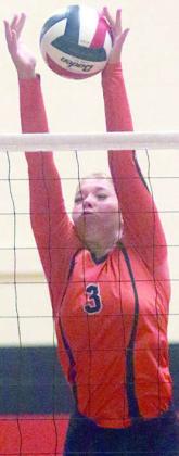Aubryn Janda rejects a Cypress Christian attack in the first set. Sticker Photo By Darrell Vyvjala