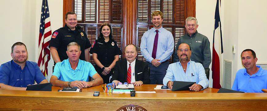 Cost of paramedic school for two EMS employees covered by County, pair of contributions from community partners