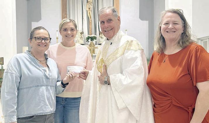 St. Anne’s donates to St. Rose building project