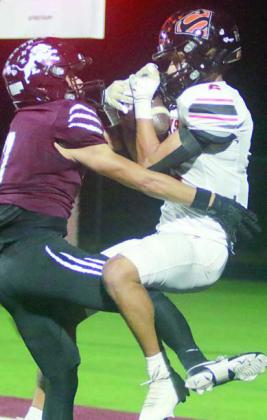 Denver Carr pulls down a 13-yard touchdown reception in the second quarter. Sticker Photo By Darrell Vyvjala