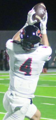 Jayse Janda hauls in a deep pass for a 52-yard touchdown in the second quarter. Sticker Photo By Darrell Vyvjala