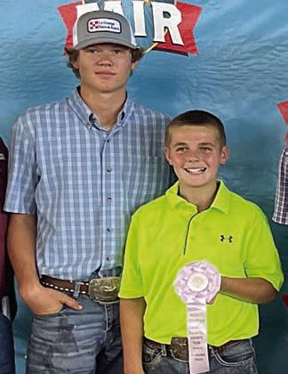 Jake Kubala, grand champion, and Teague Weiners, reserve champion, Halter Heifer.