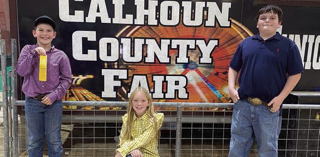 7th Place Junior Team – (from left) Hudson Holub, Abbigale Eichler and Rilan Karisch. Holub is a member of the Schulenburg 4-H.