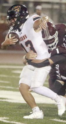 Tim Lara finishes off a 7-yard run in the fourth quarter. Sticker Photo By Darrell Vyvjala