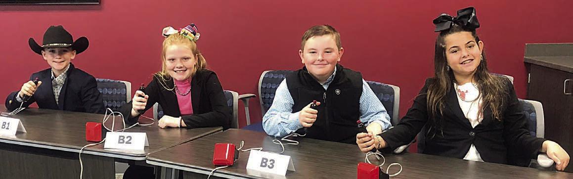The junior Livestock Quiz Bowl team, which came in fourth, included (from left) Crockett Guenther of the Schulenburg 4-H, Kaisley Janecka of the Flatonia 4-H, Abraham McBride of the Schulenburg 4-H and Adalyn Carrales of the Flatonia 4-H.
