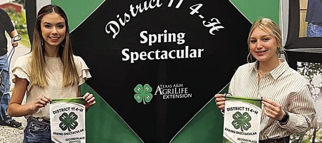 Advancing to the Texas 4-H Roundup for their educational presentation in the senior Animal Science category is the team of (from left) Tori Newton and Hope Michalke of the La Grange 4-H. Also qualifying for the Texas 4-H Roundup is the senior Livestock Quiz Bowl team of (not shown) Cooper Mau, Harper Mau, Kaylee Hensley and Cash Smith.