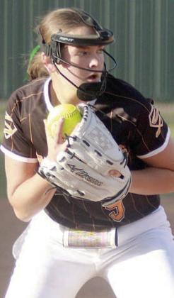 Pitcher Kerr McBride secures a ground ball in the process of throwing a Lady Hornet out at first base. Sticker Photo By Darrell Vyvjala