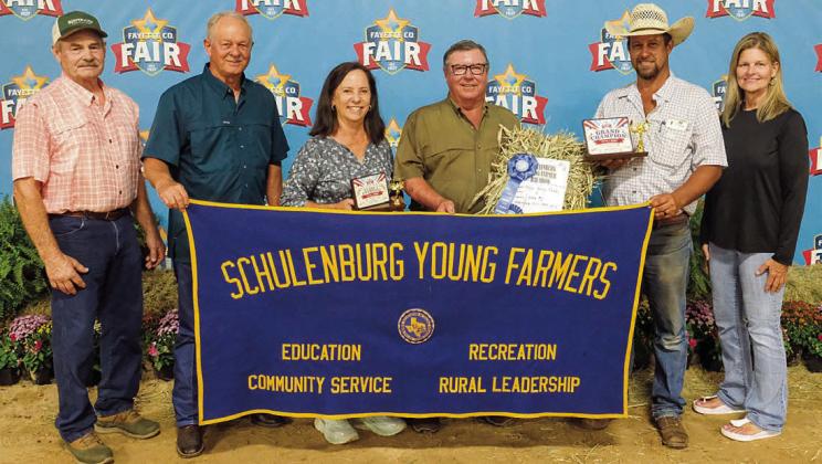 Pictured are: (from left) Mark Vecera representing La Grange Farm and Ranch, Dennis Brower of BWI, Darlene and Bob Stryk of Stryk Jersey Farm, Charles Zapalac of Schulenburg Livestock and Susan Wick of the Schulenburg Young Farmers. Photo By Andy Behlen / Courtesy of Fayette County Record