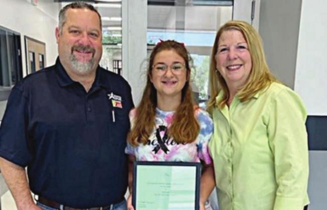 7TH GRADE • 3RD PLACE WINNER – Taylor Self (center) of Moulton ISD with her father, Scott Self, and NVCW “BFFD” chair Suzette Surman (right).