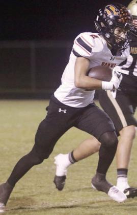 Denver Carr heads upfield on a second-quarter screen pass that gained 48 yards. Sticker Photo By Darrell Vyvjala