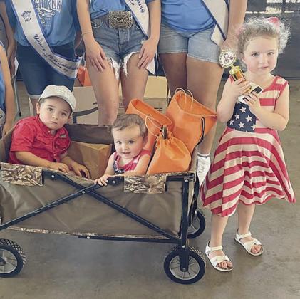 Second Place – “The Herzik Kids” - (from left) Carson, Addison, and Avery. Sticker Photo By Darrell Vyvjala