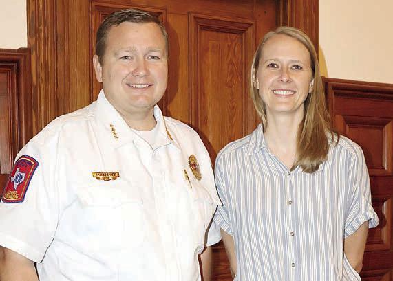 Dr. Emily Smith (right) was approved as EMS medical director by the Commissioners Court. She was introduced by EMS Director Josh Vandever (left). Photo By Melanie Berger / Courtesy of Flatonia Argus