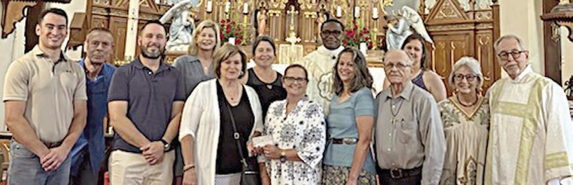 St. Anne’s Society presents donations