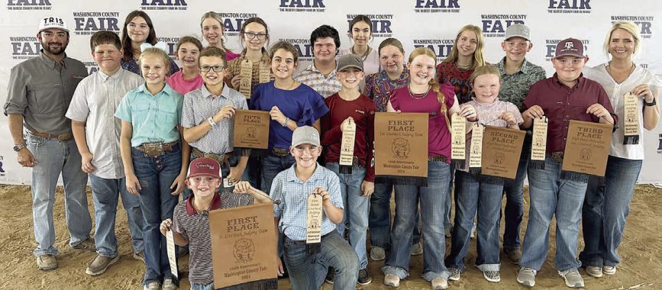 Fayette County 4-H’ers participating in the Washington County Livestock Judging Contest were (front row, from left) Joseph Carrales, Hudson Holub, (second row) Cailee Daniel, Tate Fritsch, Adalyn Carrales, Crockett Guenther, Kaisley Janecka, Abigale McBride, Abraham McBride, (third row) Hunter Gabler, Laramie Laake, Tatum Fritsch, Logan Poncik, Brealey Nieto, Peyton Gilchrest, Holden Holub, coach Kaci Carrales, (back row) coach JoJo Carrales, Addison Eichler, Hailey Janish and Tori Newton.