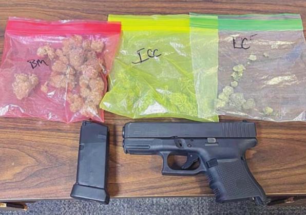 SPD officers confiscated the drugs and a firearm shown above from a vehicle that ran through a barricade last week.