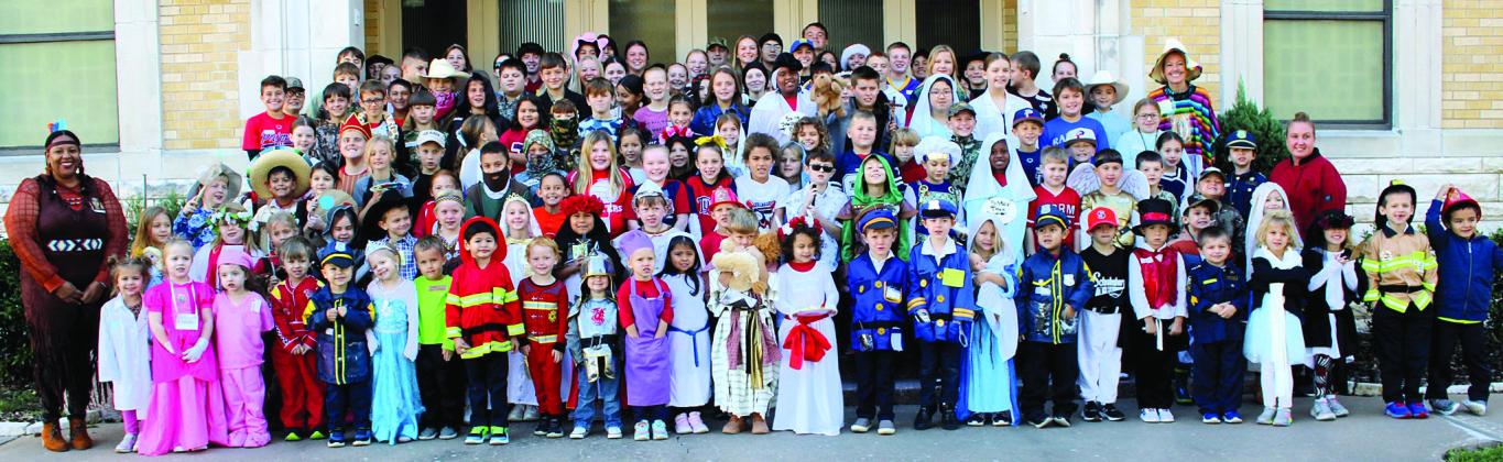 Students at St. Rose of Lima Catholic School in Schulenburg celebrated the All Saints Day Mass on Wednesday, Nov. 1. All students were encouraged to dress as a saint or a profession represented by a patron saint. Fr. Alex Aboagye reminded everyone that saints were people like them who did what God asked. The junior high students also participated in the All Souls Day Mass on Thursday, Nov. 2 and went to the cemetery with Fr. Jasper Liggio, Fr. Luke Prihoda and Fr. Alex Aboagye.