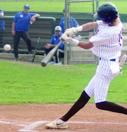 Connor Lichnovsky sends an RBI-double to right field in the first inning on Friday. Sticker Photo By Darrell Vyvjala