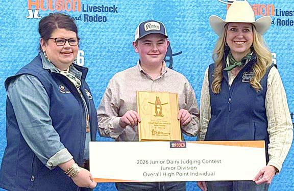 High point junior at the HLSR Dairy Judging Contest was Abraham McBride (center), pictured with two HSLR representatives. The HLSR event also served as the District 11 Dairy Judging Contest, in which McBride was high point intermediate.