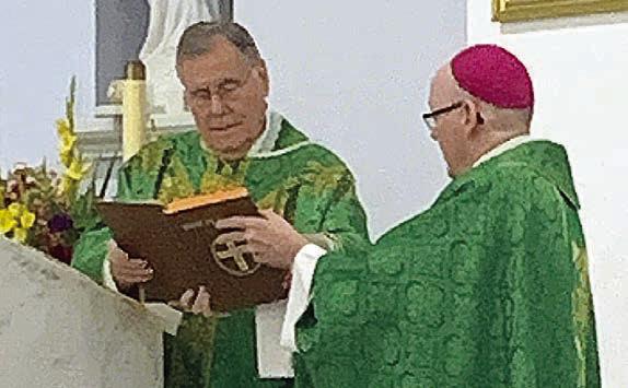 Fr. Jasper Liggio (left) was installed as pastor of St. Rose of Lima Catholic Church by Bishop Brendan Cahill (right) on Saturday, Sept. 24. Sticker Photo By Bernadette Gillings