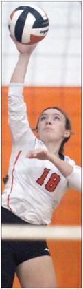Keaton Walker gets the Lady Horns off to a good start Saturday with strong serving early in the match. Sticker Photo By Darrell Vyvjala